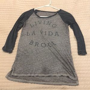 Baseball styled shirt.